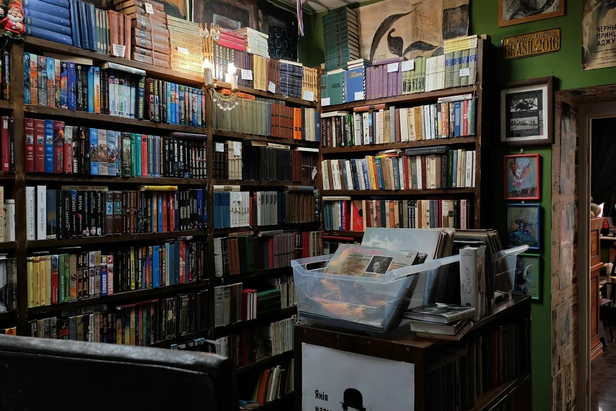 Cozy bookstore interior with floor-to-ceiling shelves of books
