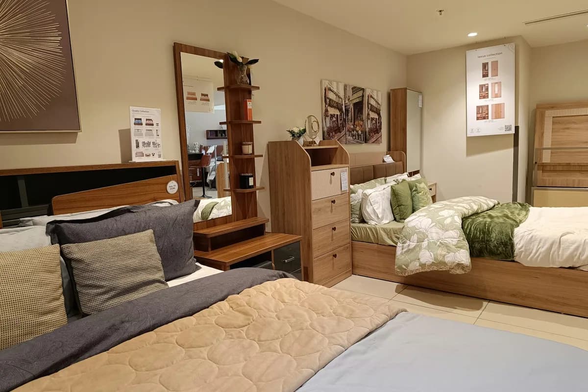 Bedroom furniture sets displayed in a retail furniture showroom